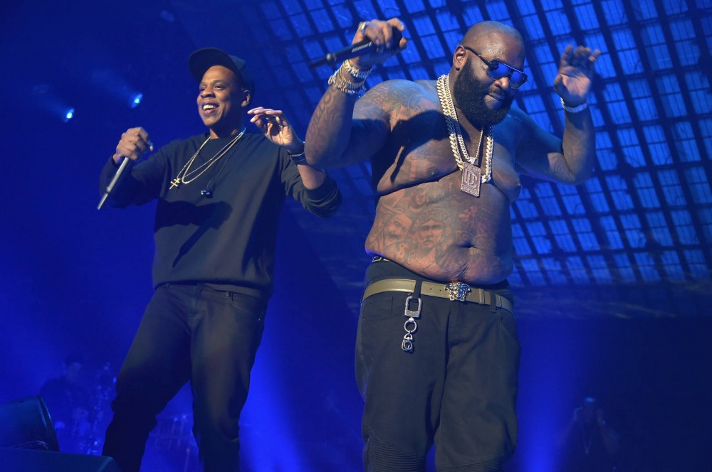 Rappers Jay-Z (L) and Rick Ross perform onstage during TIDAL X: 1020 Amplified by HTC at Barclays Center of Brooklyn on October 20, 2015 in New York City.